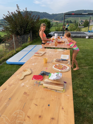 Pizza backen im Steinofen