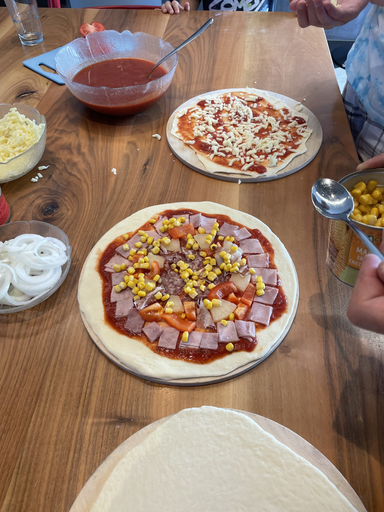 Pizza backen im Steinofen